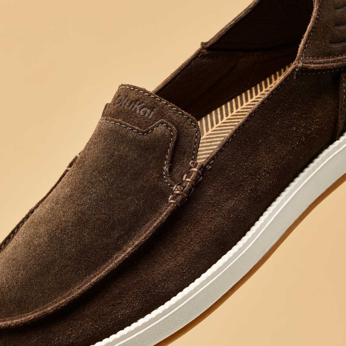 OluKai Kākaha Nia Men‘s Suede Slip-On Shoes - Dark Wood