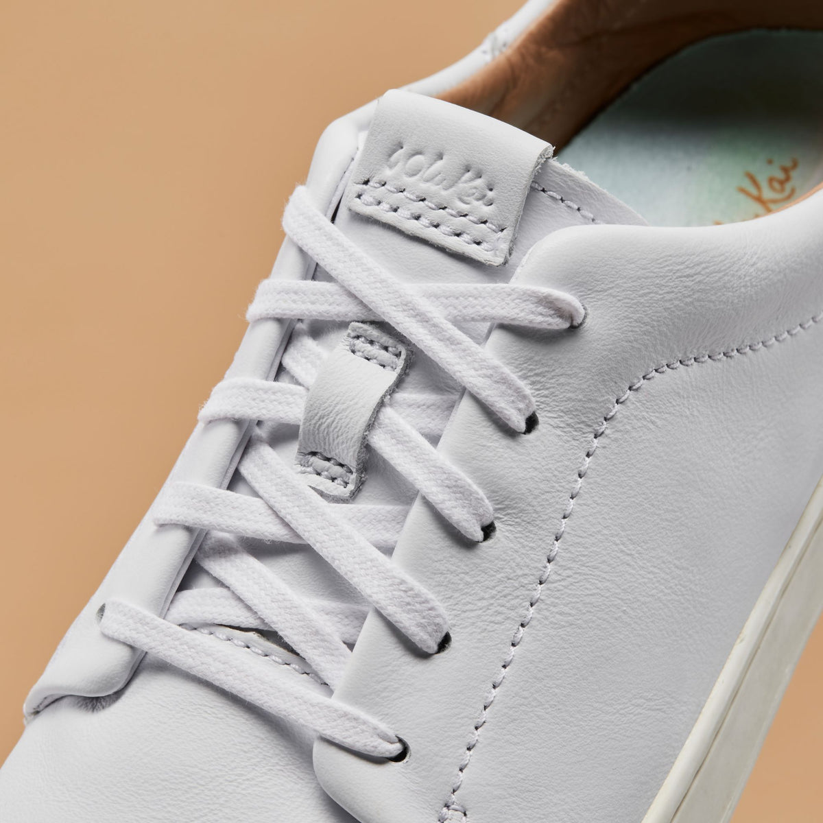 OluKai Pehuea Lī ‘Ili Women's Leather Sneakers - White