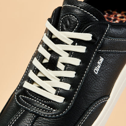 OluKai Hā‘upu Women’s Leather Sneakers - Onyx
